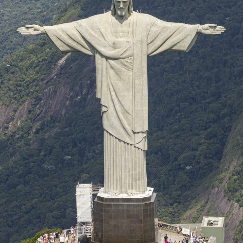 The Christ the Redeemer statue above Rio de Janeiro at sunrise The Christ the Redeemer statue above Rio de Janeiro at sunrise