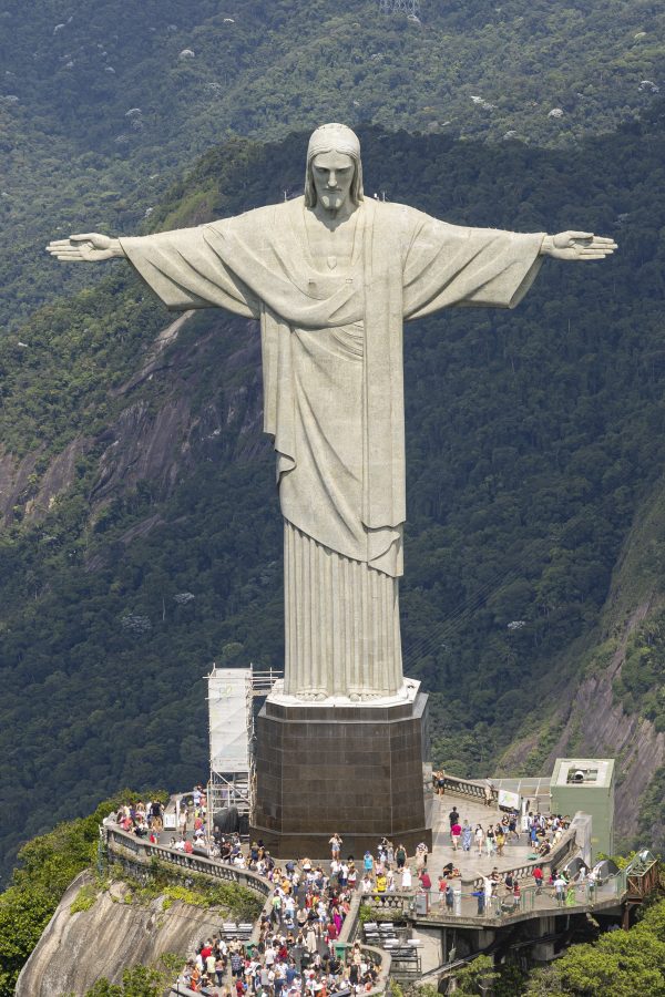 The Christ the Redeemer statue above Rio de Janeiro at sunrise The Christ the Redeemer statue above Rio de Janeiro at sunrise