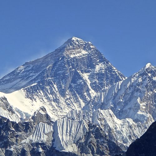 Mount Everest and the Himalayan range above the clouds